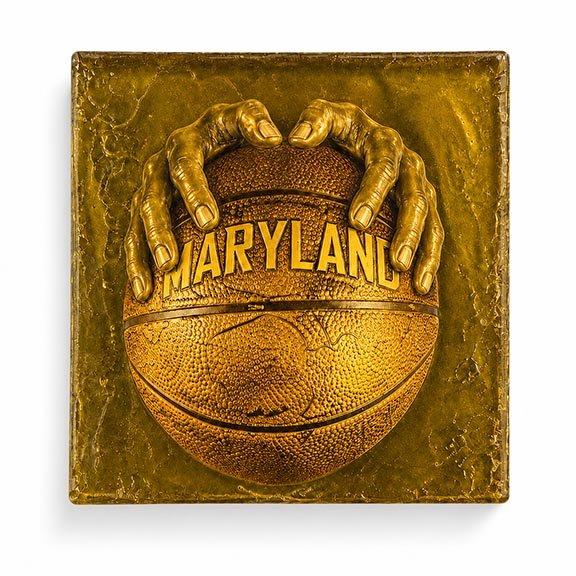 Cast glass tile with hands gripping a Maryland basketball